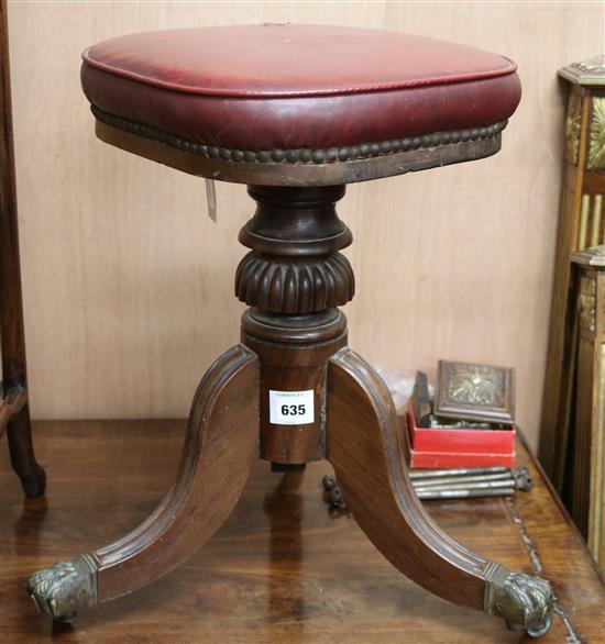 A late Georgian mahogany adjustable piano stool